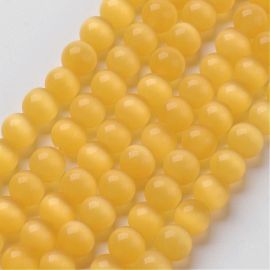 Beads of the cat's eye. Rich yellow size 8 mm