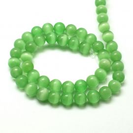 Beads of the cat's eye. Light greenish size 8 mm