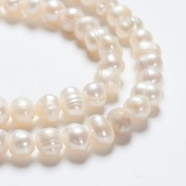 Natural freshwater pearls 5-6 mm. 1 thread.
