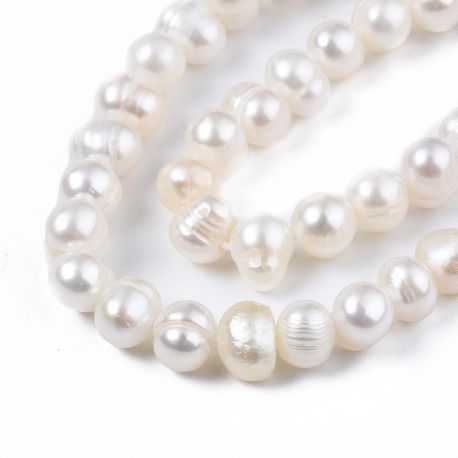 Natural freshwater pearls 7-5x5-4 mm. 1 thread