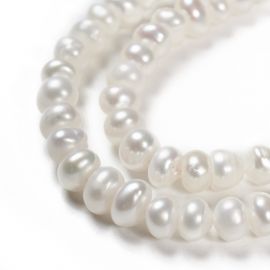 Natural freshwater pearls 6-5x4 mm. 1 thread