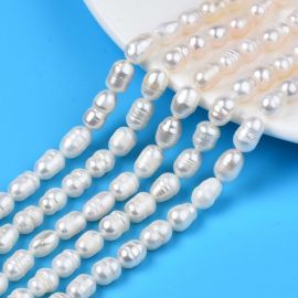 Natural freshwater pearls 12-8x7-6 mm. 1 thread