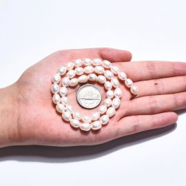Natural freshwater pearls grade A 9-8x7-6 mm. 1 thread