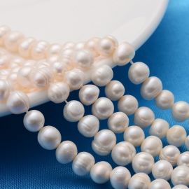 Natural freshwater pearls 7-6 mm. 1 thread