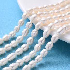 Natural freshwater pearls 9-7x7-6 mm. 1 thread