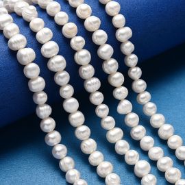 Natural freshwater pearls class A 8-7 mm. 1 thread