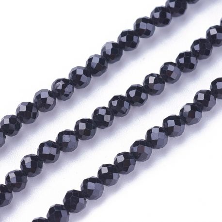 Kivihelmed - Natural Black Spinel helmed. Must värv Ümarate servadega siseaugu läbimõõt ~05 m