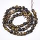 Looduslikud Tiger Eye helmed 6 mm. 1 niit