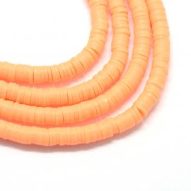 Polimerinio molio karoliukai. Šviesiai oranžinės spalvos heishi dydis 8x05-1 mm 1 gija