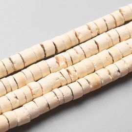 Natūralūs Kokoso karoliukai. Gelsvos (smėlio) spalvos rondelės nedažyti skylės diametras ~1.00 mm. dydis 5x25-5 mm 1 gija