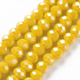 Glass beads. The diameter of the yellow ring faceted hole is ~0.80 mm. size 3x2 mm 1 strand