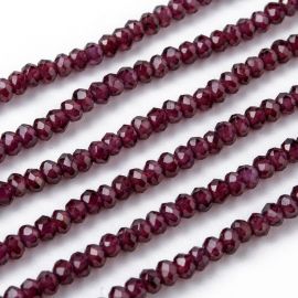 Natural garnet beads. Dark cherry-colored washers, ribbed, partially transparent, size 3x2 mm, 1 thread