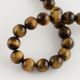 Natural beads of the tiger eye 14 mm., 1 strand AK1252