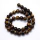 Natural beads of the tiger eye 6-7 mm., 1 strand AK1251