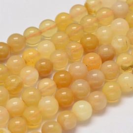 Dabīgas dzeltenas opāla pērlītes 6 mm., 1 dzīsla